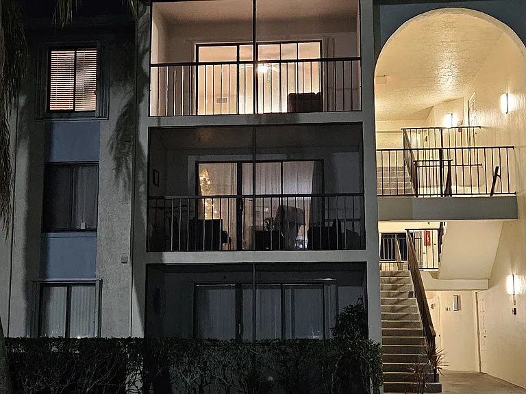 Well lit entry ways with reserved parking in front of unit