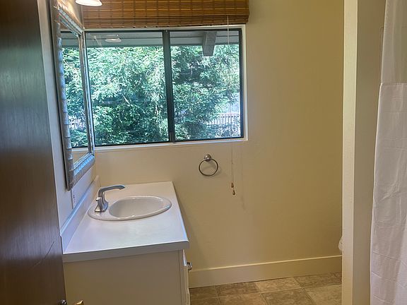 Bath Room with Shower & Tub. Tile floors.