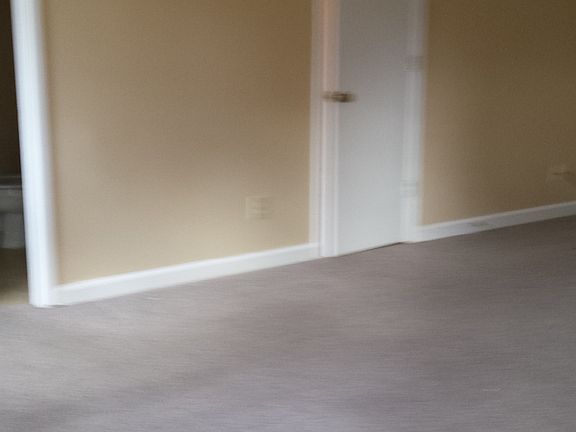 his and her closets in master suite