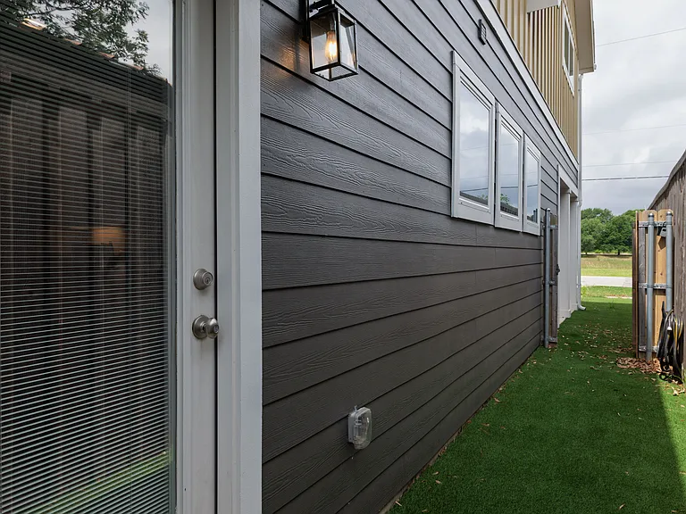 Cozy backyard with a comfortable outdoor couch_perfect for lounging or enjoying fresh air.
