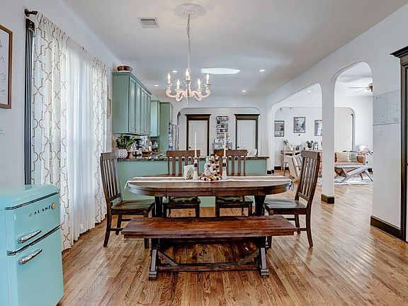 Open concept dining room just beyond the entrance. Note the real hardwood floors throughout the main level.