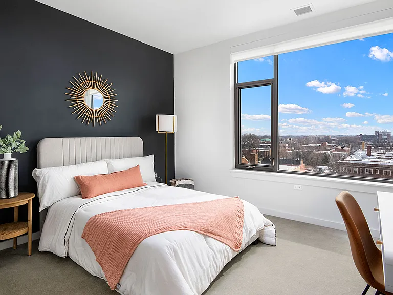 With bold design and skyline views, this Eleven33 bedroom blends boutique style with everyday comfort modern, bright, and distinctly Oak Park.