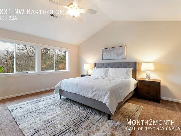 9831 NW Bartholomew Dr — Photo 10