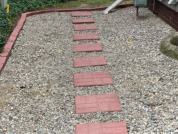 lighted walkway to the back yard