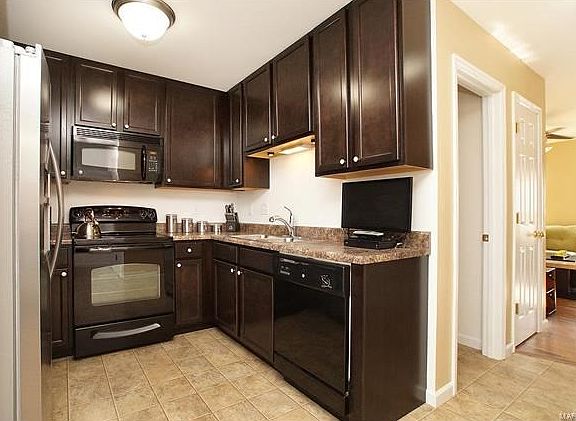 4 inch cabinets and black appliances