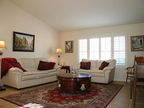 Wood shutters and wood blinds throughout