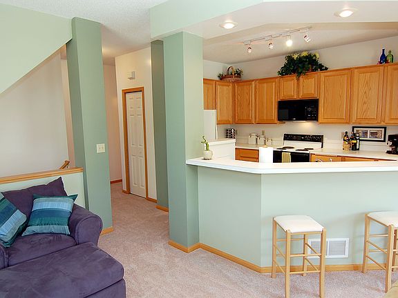 Kitchen opens into living area