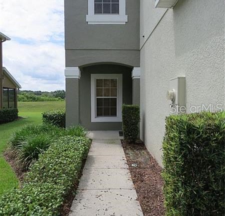 Private walkway with mature landscaping