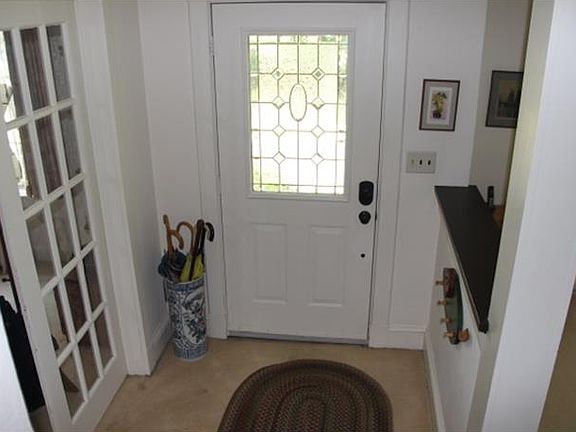 SIDE VIEW SHOWS PORCH & DECK OFF MASTER SUITE