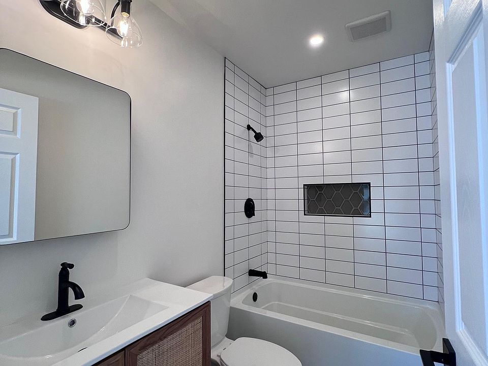 Bathroom with deep soaking tub shower