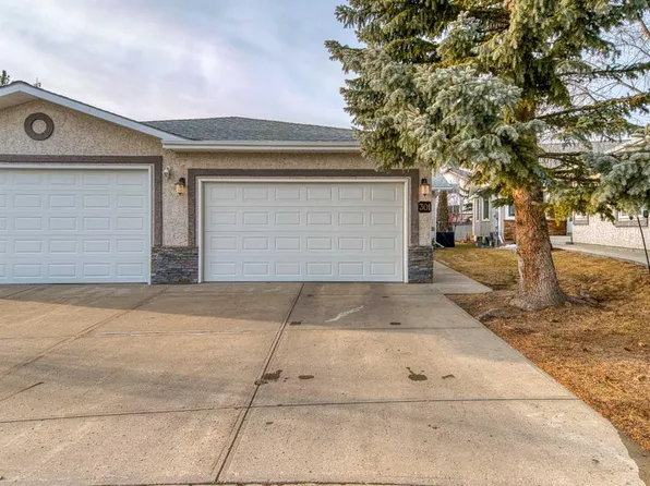 301 SE Arbour Cliff Close NW, Calgary, AB T3G 3W8