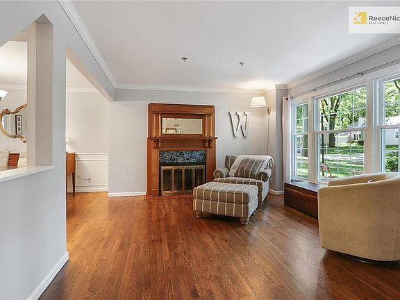 1 of two living areas on the main floor - this boasts a brand new bay window.