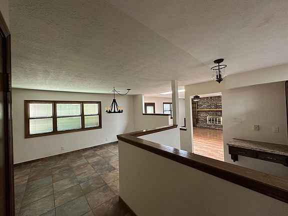 Open concept kitchen, dining room and living room.