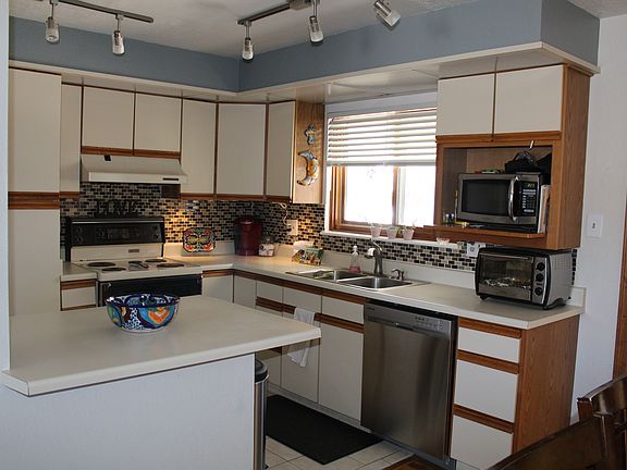 Kitchen opens up to dining area and living room.