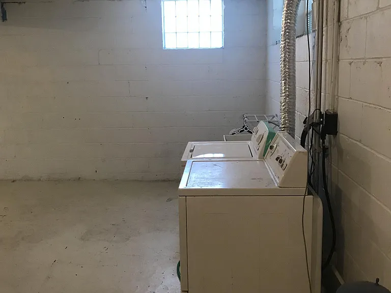 Basement with washer and dryer