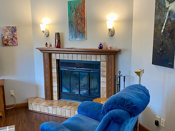 Family room with wood-burning fireplace