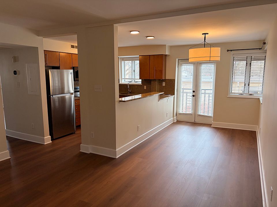 Kitchen and dining room open to the kitchen. New floors throughout.