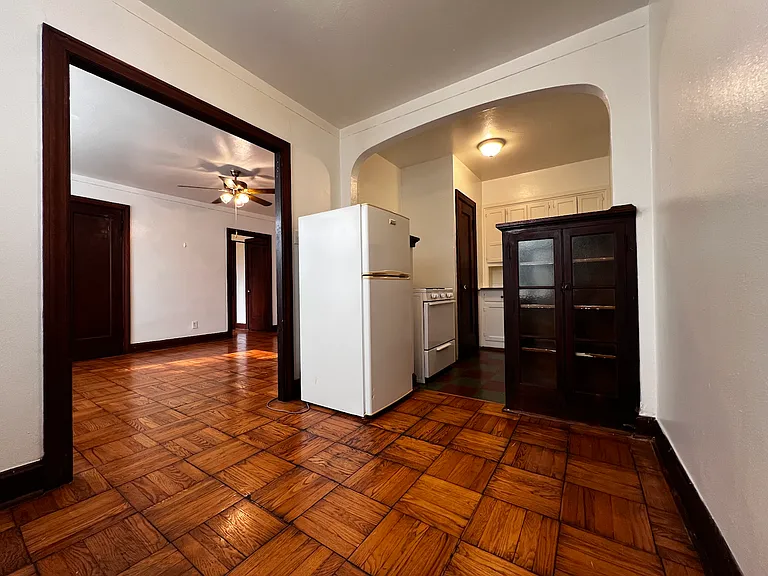 Looking from dining area into kitchen and main room.