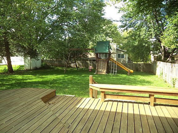 View of deck and entire back yard from dinning room's patio door