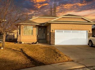 310 W Riverside Gdns NW, High River, AB T1V 1Y9