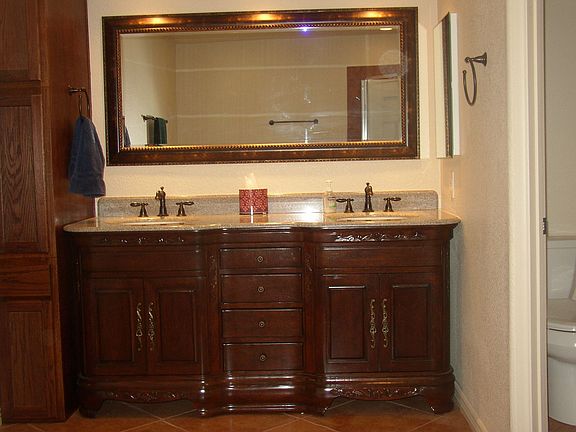 dual sinks with granite countertops