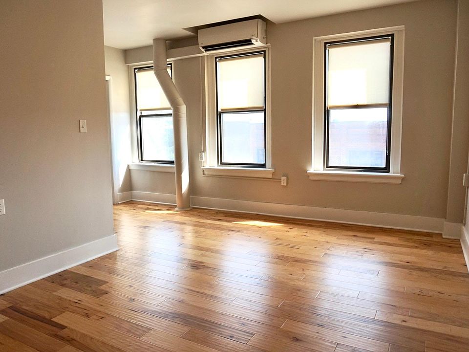 Living space with a Main St. view and beautiful floors