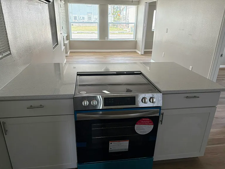 Quartz countertops and upgraded slide in stove