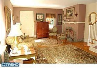 Living Room w/ Stone Fireplace