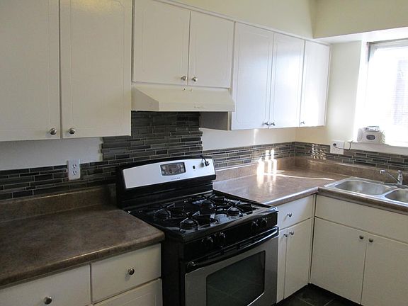 Kitchen with Stainless Steel and Black Appliances