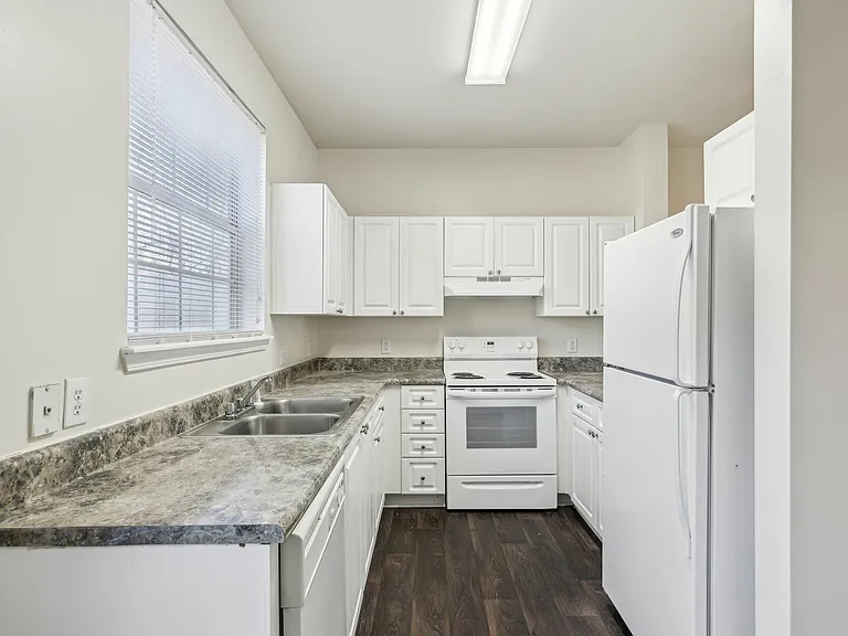 Experience modern cooking in this elegant kitchen with sleek surfaces and ample storage. Experience modern cooking in this elegant kitchen with sleek surfaces and ample storage.