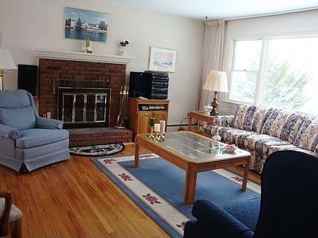 Living w/ Fireplace & hardwood flooring