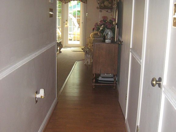 hall way with chair railing