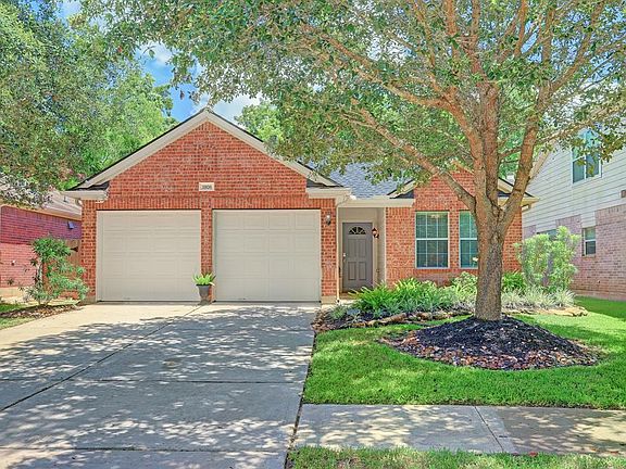 Parking is a snap in the attached 2 car garage and double wide driveway.