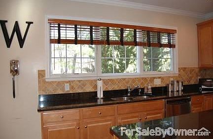 Kitchen Overlooks Private Backyard
						:
						Extra Kitchen Windows offer plenty of sunlight