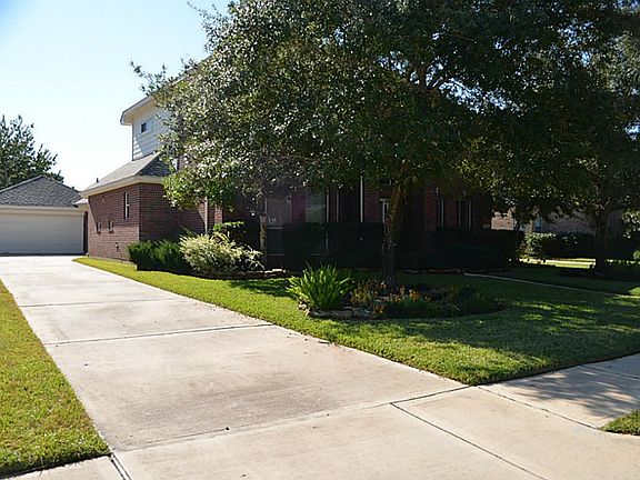 Mature landscaping, sprinkler system