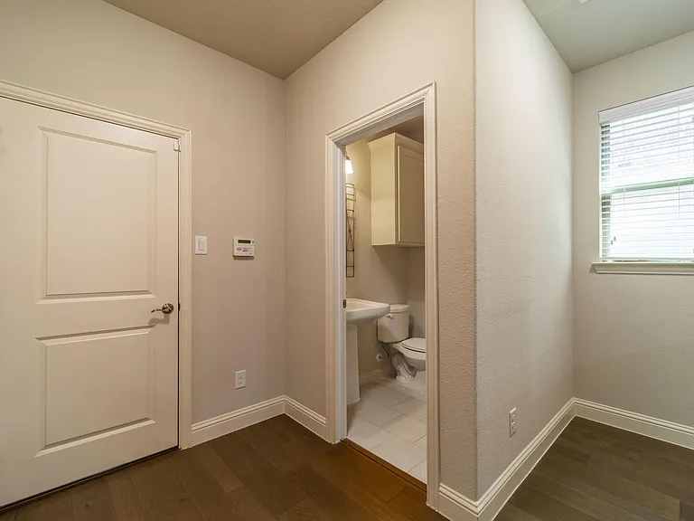 Half bath located conveniently near the main living spaces