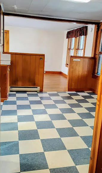 View of Kitchen and Living Room from Bedroom.