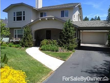 Front
						:
						Attached garage to the rear through porte cochere (car port); Quiet cul de sac.
