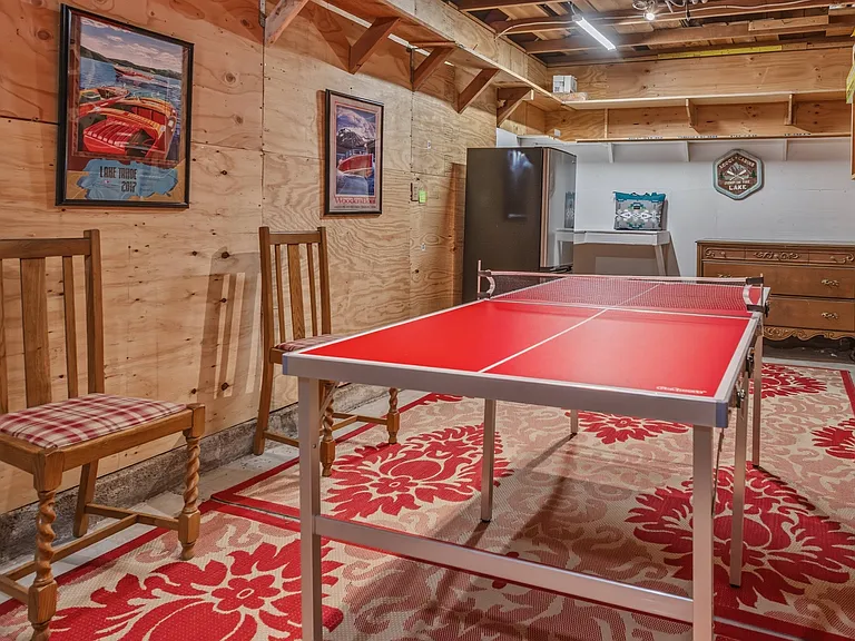 Bonus game room located in the detached garage (includes a ping pong table and extra full size refrigerator). Also a great place to store ski equipment during winter!