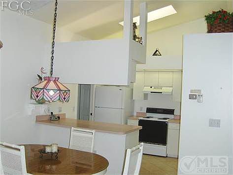 Open Kitchen with skylight and decorative ledges.