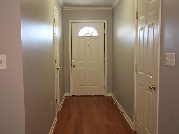 Entrance (L-R: coat closet, front door, garage door)