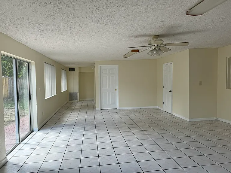Sunroom, with nook (left) and bedroom #4 (center)