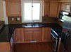 Granite countertops, cherry cabinets and stainless