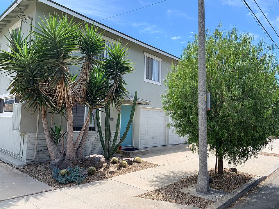 First floor unit, showing the Front Door, Garage and Landscaping!