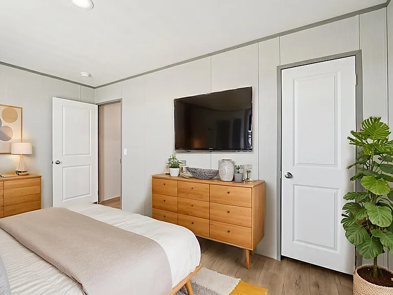 Comfortable secondary bedroom with ample space for relaxation or guests.