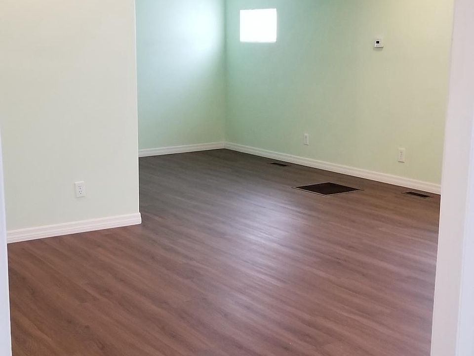 Living area, new floors, new windows, new pot lights, seatin