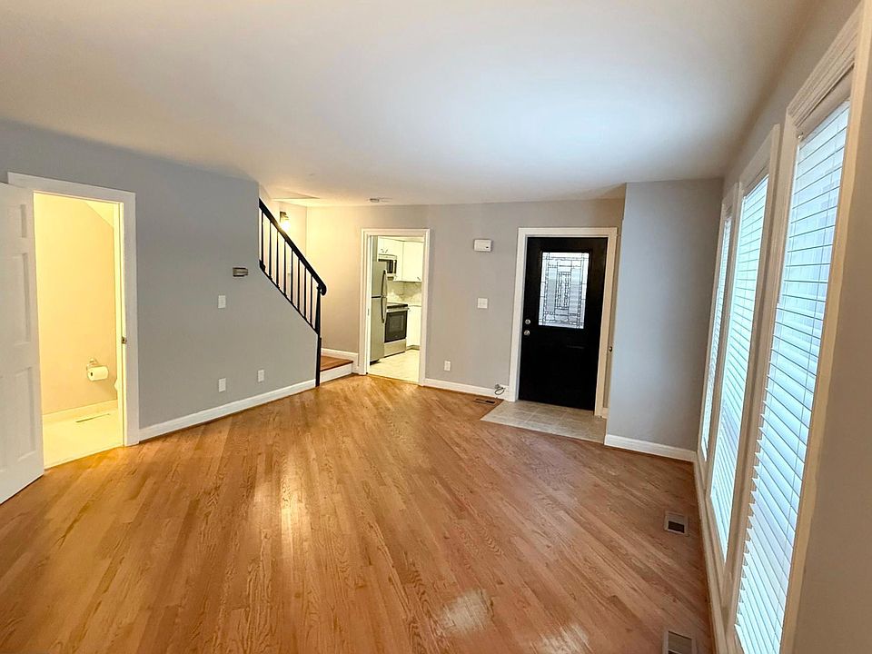 Living Room w/access to half bath.