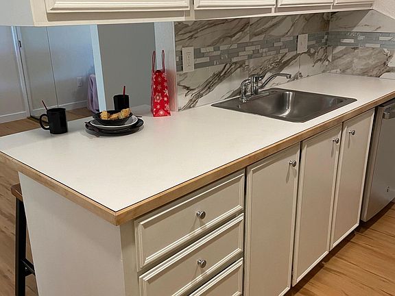 KITCHEN with DECORATIVE TILED BACK SPLASH