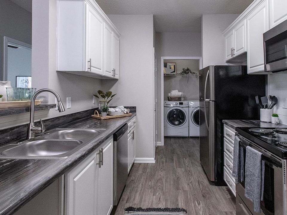 Embrace our charming galley-style kitchens with ample cabinetry and a pantry for optimal storage and organization.