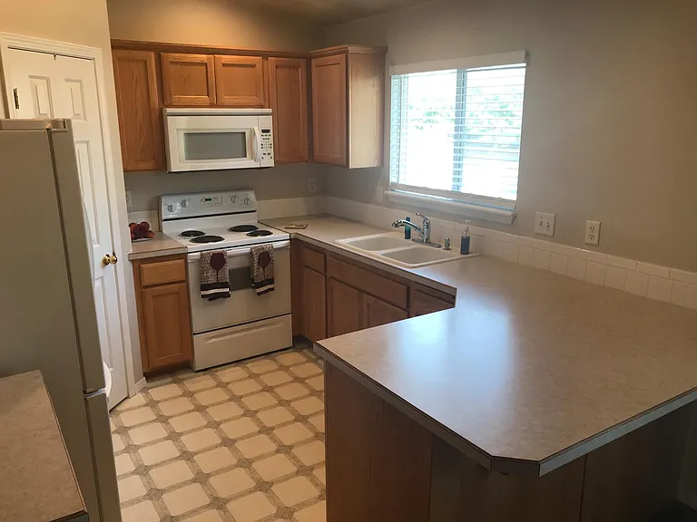 Kitchen has it all plus a time saving walk in pantry!